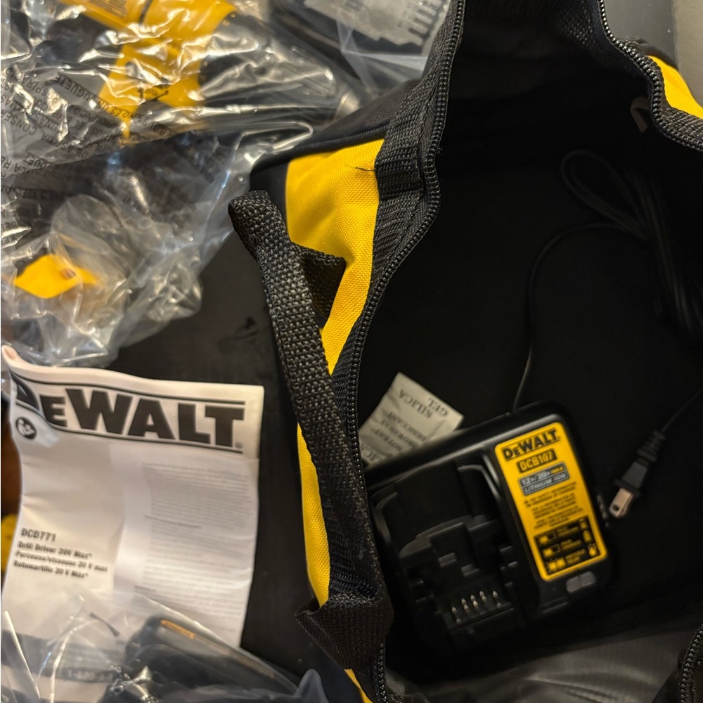 DEWALT Black and Yellow Drill with two batteries and charger